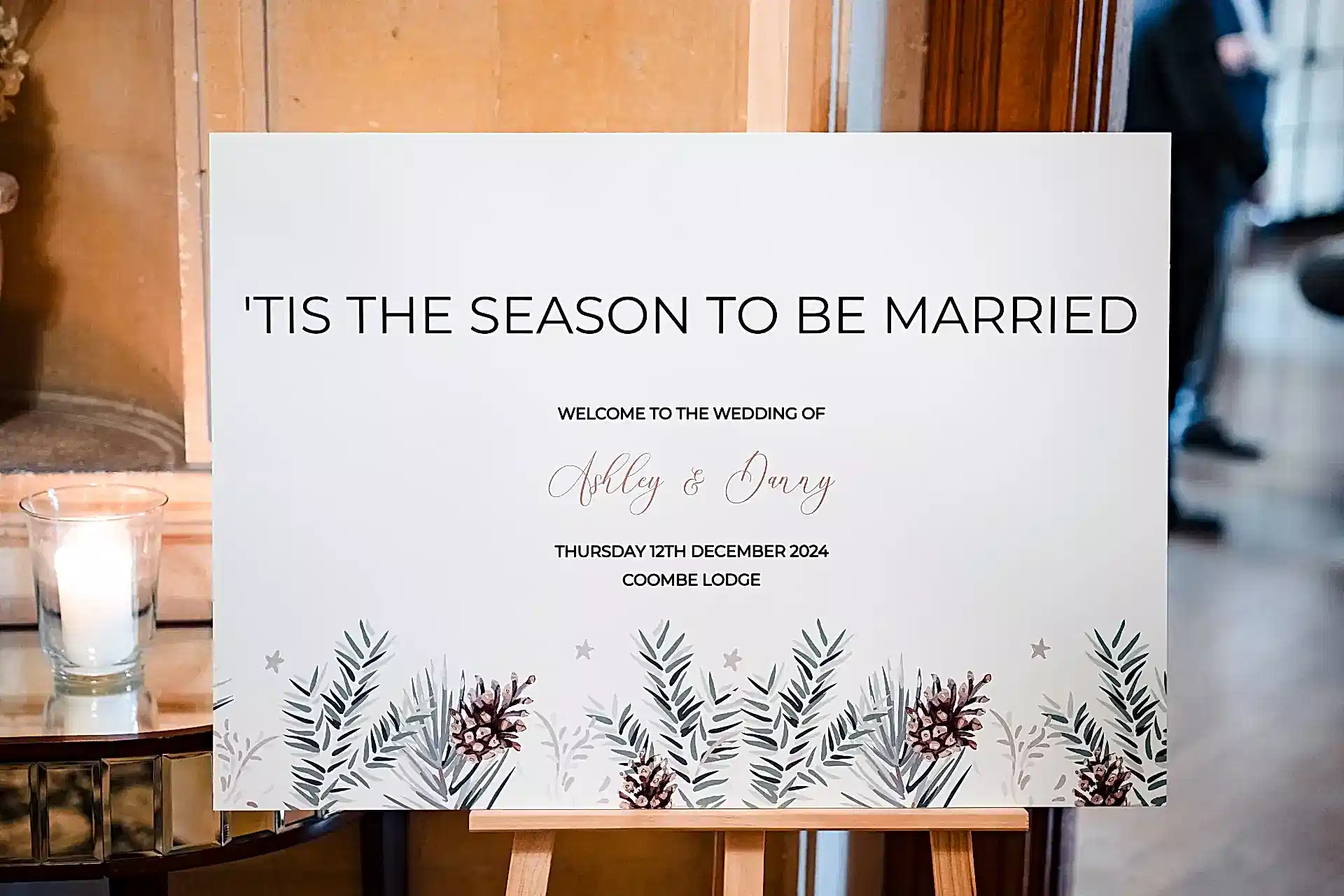 a planning a winter wedding idea showing a white board with the wedding details on it