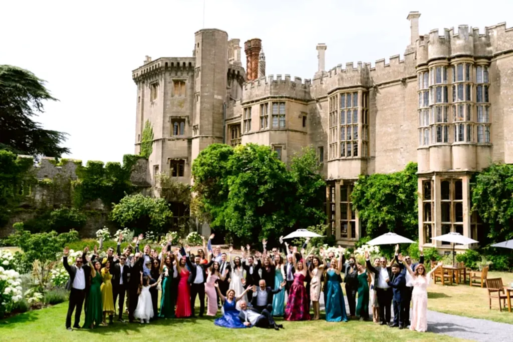 a wedding group photo at a castle wedding