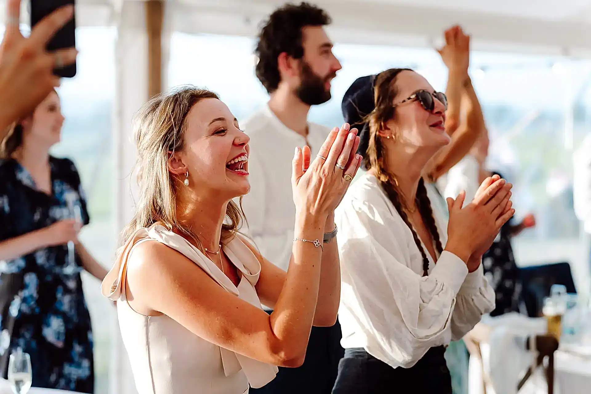 recommended suppliers image showing guests clapping at their suppliers inside the marquee
