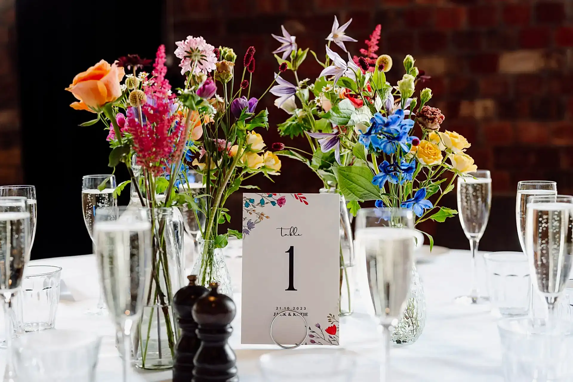 a wedding breakfast table with flowers and glasses at an avon gorge hotel wedding
